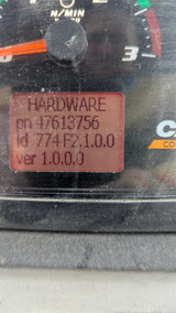 Close-up of a vehicle dashboard with a hardware label on a blurred background