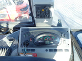 Dashboard of a vehicle with control panel and gauges